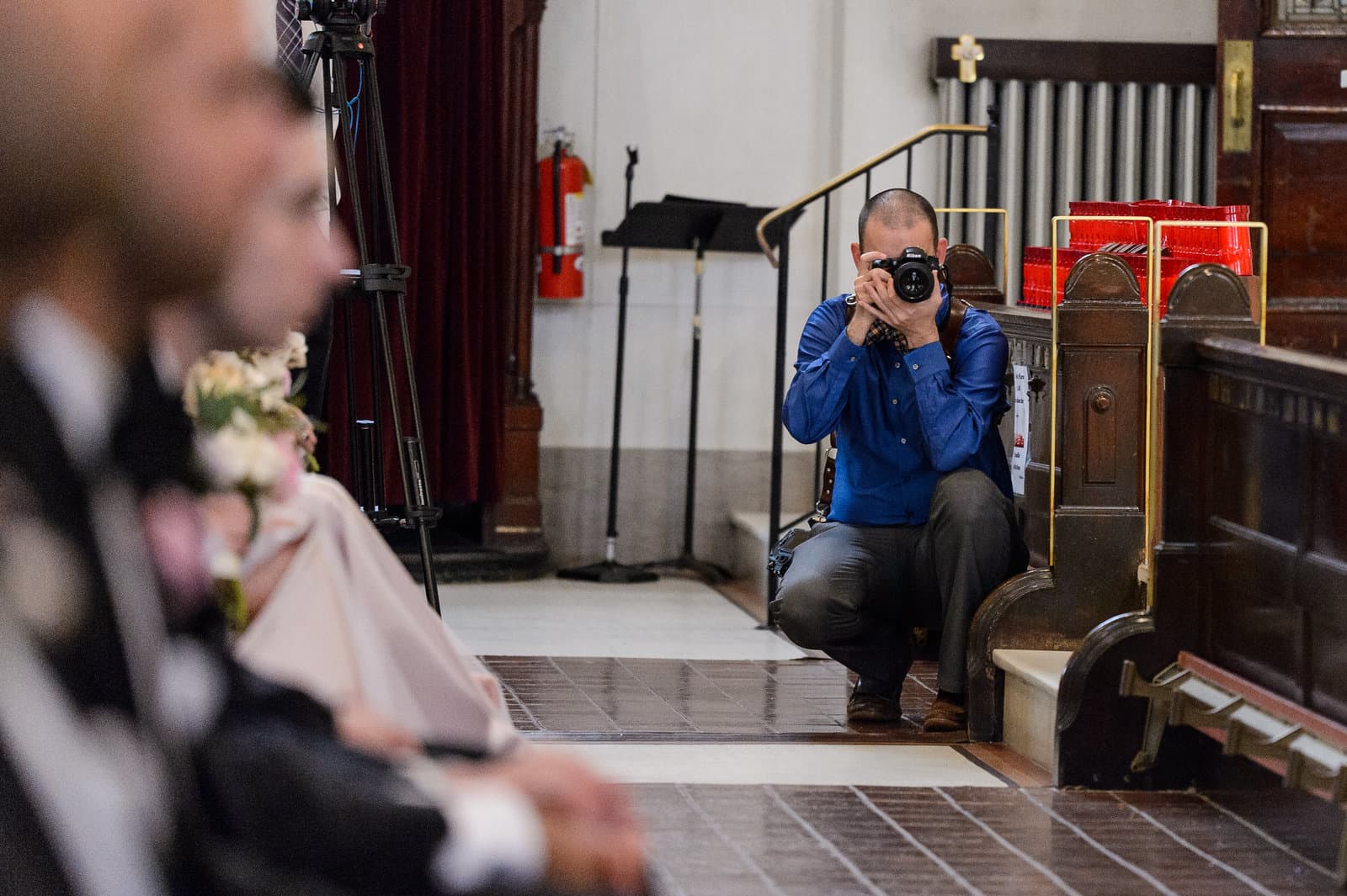 Russ Hickman photographing on a wedding day